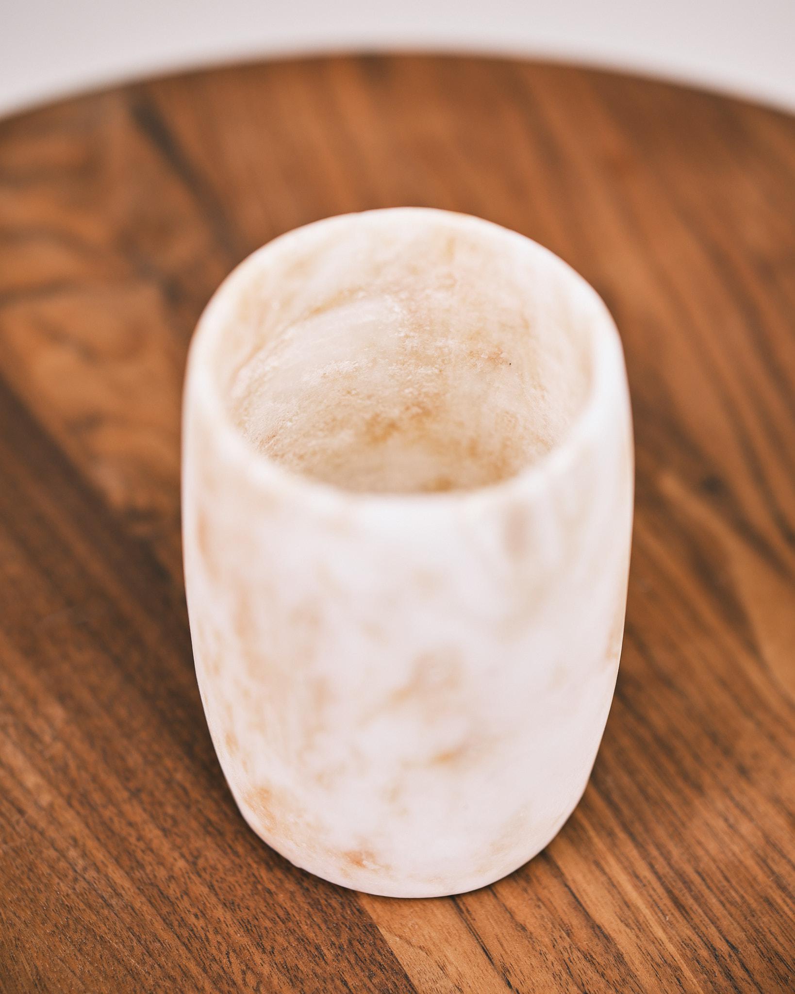 small alabaster cylinder vase